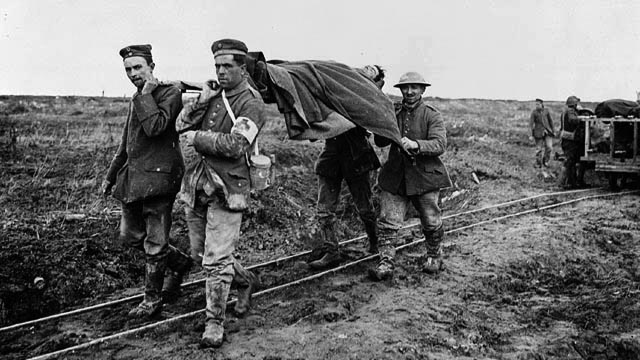 German POWs carry Canadian wounded at Vimy Ridge